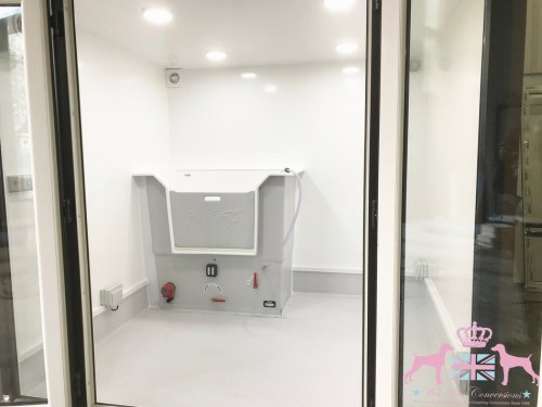 7x8ft Pod with brown external wood effect cladding and hydro bath