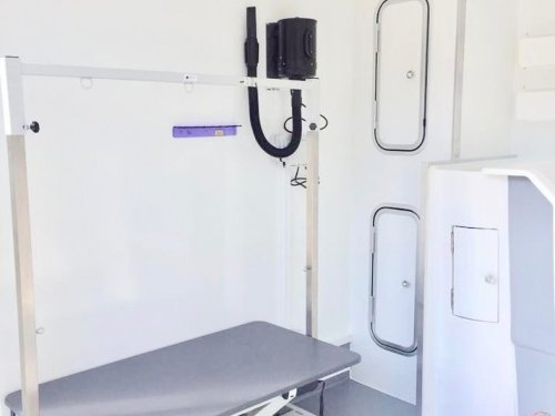 8x8ft With a Deluxe and composite wood effect cladding with black glazing frames