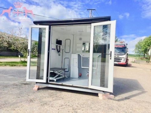 8x8ft With a Deluxe and composite wood effect cladding with black glazing frames