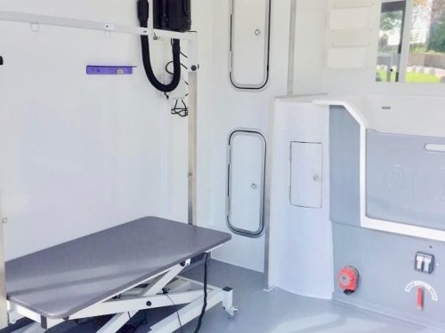 8x8ft With a Deluxe and composite wood effect cladding with black glazing frames