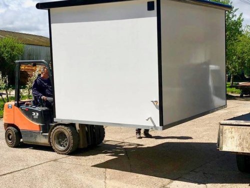 10x8 bespoke with black glazing frames, dog door and custom shelf