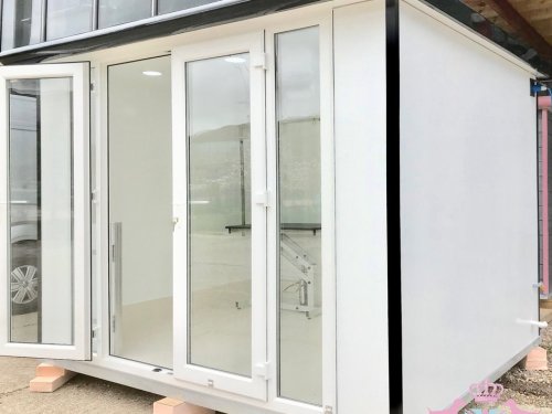 10x8 bespoke with black glazing frames, dog door and custom shelf