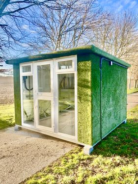 Turf covered pod