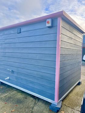 Pink pod with crates