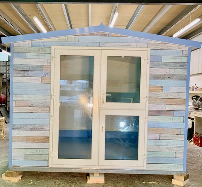 Turquoise pod pitched roof