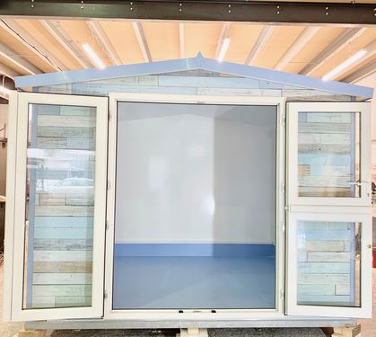 Turquoise pod pitched roof