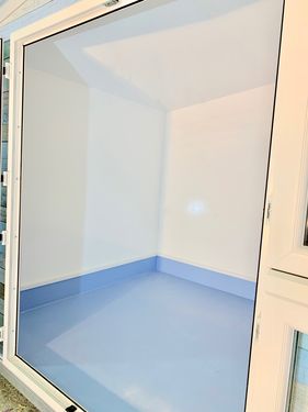 Turquoise pod pitched roof