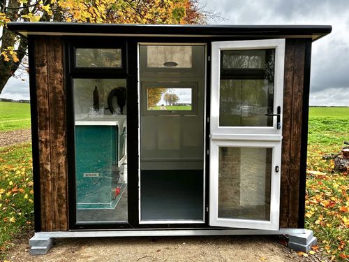 10x8ft Bespoke pod with wood effect wrap and extras